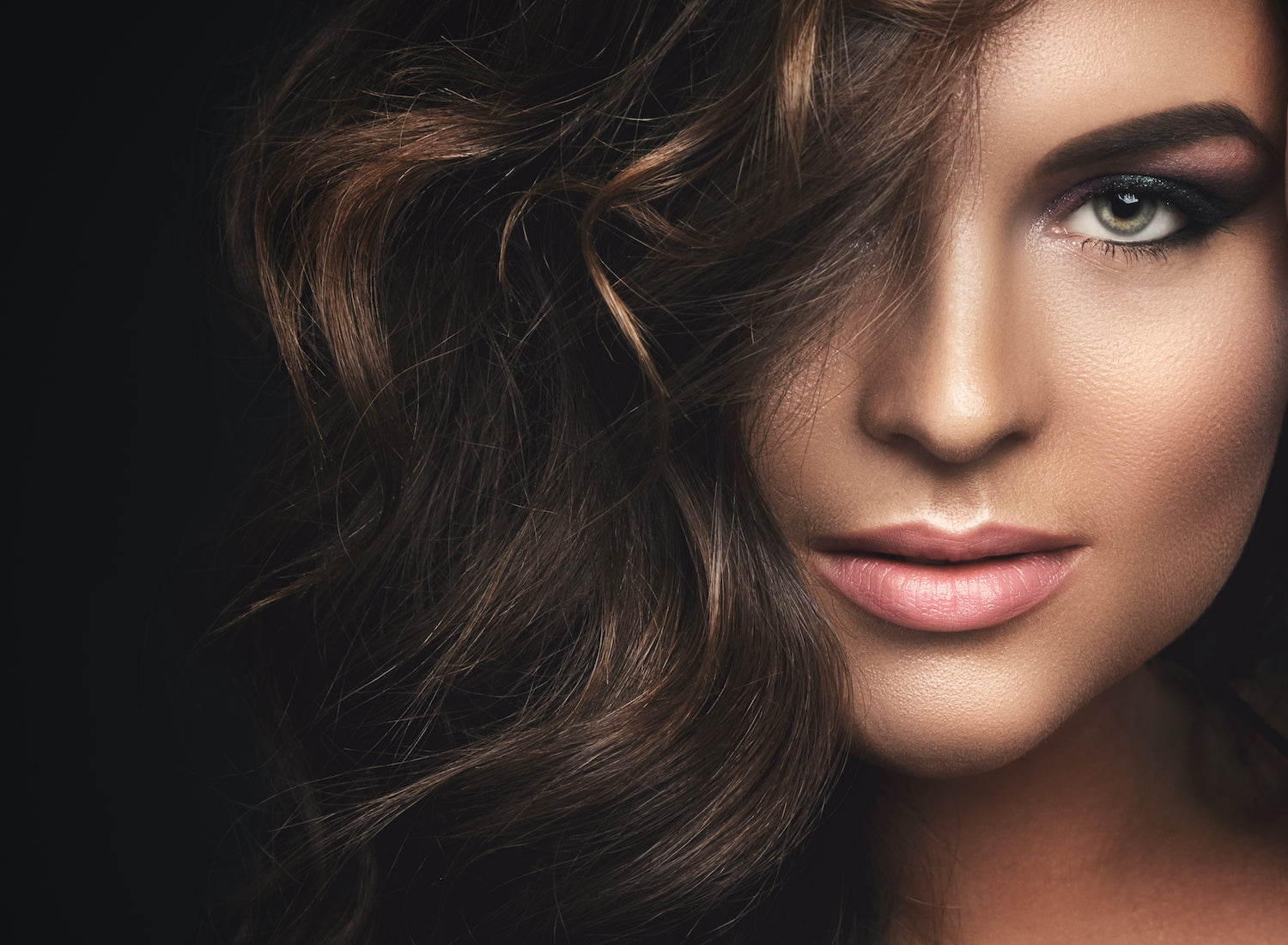 Portrait of Woman with curly hair and beautiful make-up